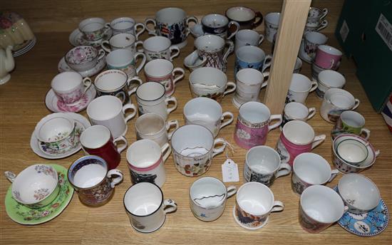 A collection of moustache mugs and various others